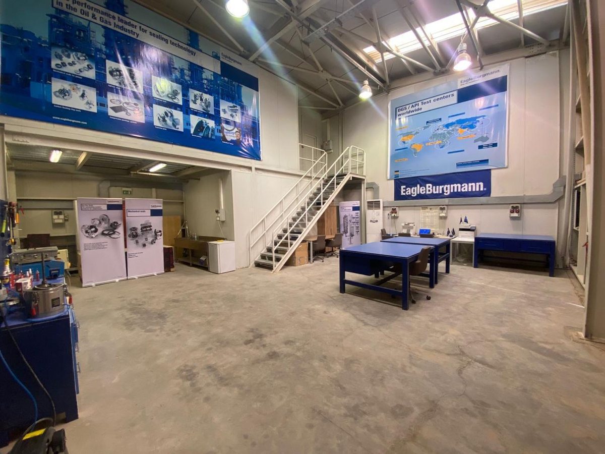 ATAS Service Center building with EagleBurgmann and ATAS Al Turuq Al Shamelah signage in Energy City, Basra